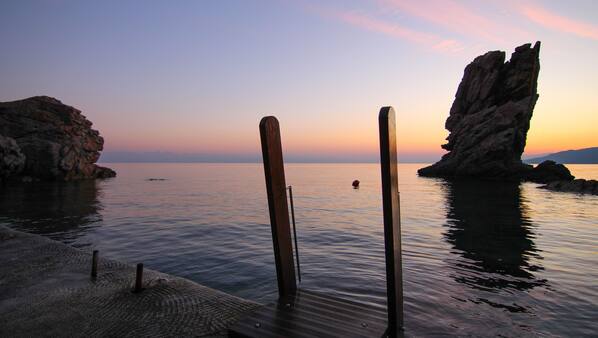 On the beach, sun-loungers, beach umbrellas, beach towels