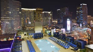 Outdoor pool, open 10:00 AM to 8:00 PM, pool umbrellas