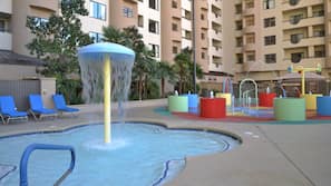 Outdoor pool, open 10:00 AM to 8:00 PM, pool umbrellas