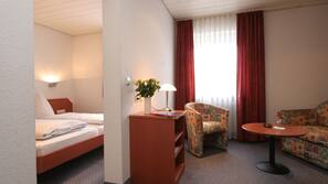 Luxe beddengoed, pillowtop-bedden, een kluis op de kamer