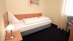 Luxe beddengoed, pillowtop-bedden, een kluis op de kamer