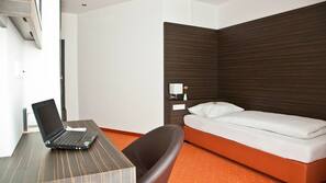 Luxe beddengoed, pillowtop-bedden, een kluis op de kamer
