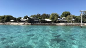 Private beach, white sand, sun-loungers, beach umbrellas