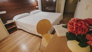 Desk, free WiFi, bed sheets