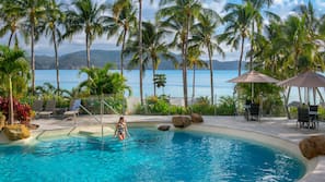 Outdoor pool, pool umbrellas, sun loungers