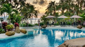 Outdoor pool, pool umbrellas, sun loungers