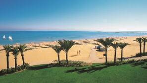 Private beach nearby, free beach shuttle, sun loungers, beach umbrellas