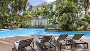 Outdoor pool, open 7 AM to 9 PM, free pool cabanas, pool loungers