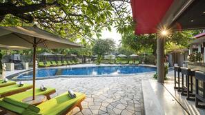 Outdoor pool, open 8:00 AM to 6:00 PM, pool umbrellas, pool loungers