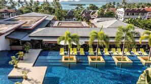 2 outdoor pools, pool umbrellas, pool loungers