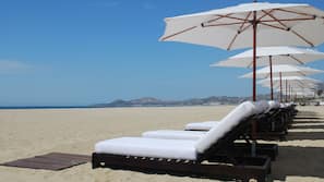 On the beach, free beach cabanas, sun loungers, beach umbrellas