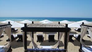 On the beach, free beach cabanas, sun loungers, beach umbrellas
