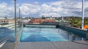 Seasonal outdoor pool, pool umbrellas