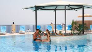 2 outdoor pools, pool umbrellas, pool loungers