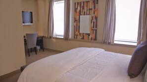 Egyptian cotton sheets, premium bedding, down comforters, minibar