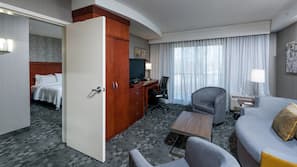 Premium bedding, pillow-top beds, desk, laptop workspace