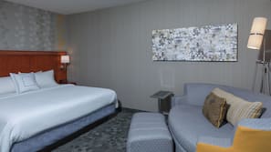 Premium bedding, pillow-top beds, desk, laptop workspace