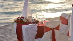 On the beach, white sand, beach towels, waterskiing