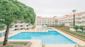 Indoor pool, outdoor pool, pool umbrellas, pool loungers