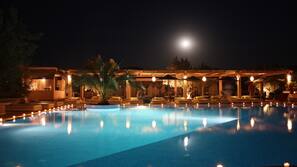 Outdoor pool, open 8:00 AM to 7:00 PM, free pool cabanas, pool umbrellas