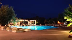 Outdoor pool, open 8:00 AM to 7:00 PM, free pool cabanas, pool umbrellas