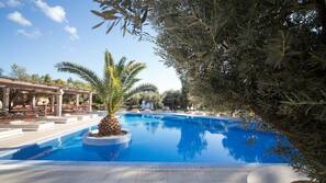 Outdoor pool, open 8:00 AM to 7:00 PM, free pool cabanas, pool umbrellas