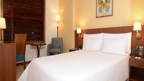 Premium bedding, down comforters, minibar, in-room safe