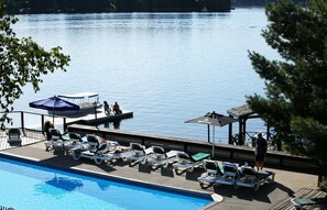 Indoor pool, outdoor pool, open 9:00 AM to 10 PM, pool umbrellas