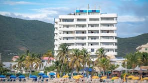 On the beach, sun loungers, beach umbrellas, beach towels