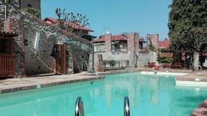 Seasonal outdoor pool, pool umbrellas, sun loungers
