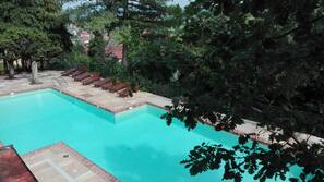 Seasonal outdoor pool, pool umbrellas, sun loungers