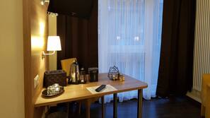 Hypo-allergenic bedding, desk, laptop workspace, iron/ironing board