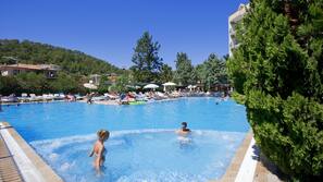 Indoor pool, outdoor pool, pool umbrellas, pool loungers