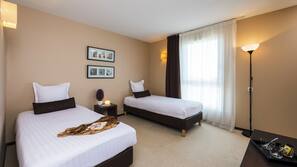 In-room safe, desk, blackout curtains, soundproofing