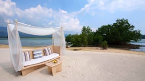 Private beach, sun-loungers, beach towels, beach massages