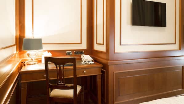 Biancheria da letto di alta qualità, minibar, cassaforte in camera