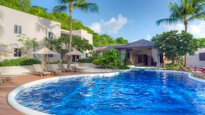 2 outdoor pools, pool umbrellas, pool loungers