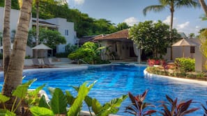 2 outdoor pools, pool umbrellas, pool loungers