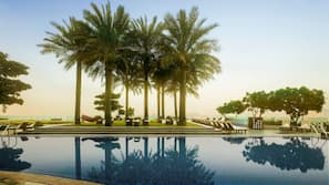 Outdoor pool, pool umbrellas, pool loungers