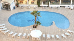 2 outdoor pools, pool umbrellas, pool loungers