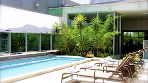 Outdoor pool, pool umbrellas, pool loungers