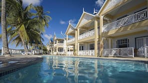 2 outdoor pools, pool umbrellas, sun loungers