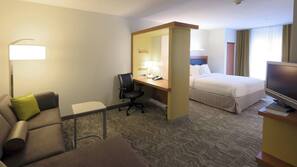 Premium bedding, desk, laptop workspace, blackout drapes