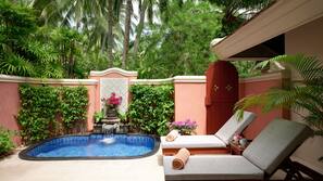 Outdoor pool, open 7:00 AM to 6:00 PM, pool umbrellas, pool loungers