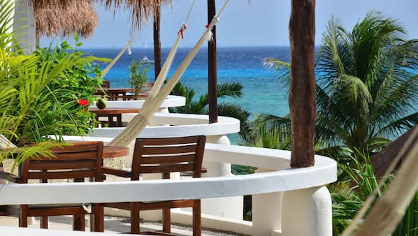 Private beach, beach umbrellas, beach towels, beach bar