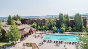 Seasonal outdoor pool, cabanas (surcharge), pool umbrellas