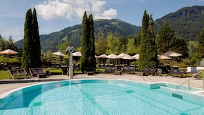 Indoor pool, outdoor pool, pool umbrellas, pool loungers