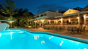 Outdoor pool, pool umbrellas, sun loungers