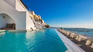 Seasonal outdoor pool, pool umbrellas, sun loungers