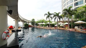 Outdoor pool, pool umbrellas, sun loungers